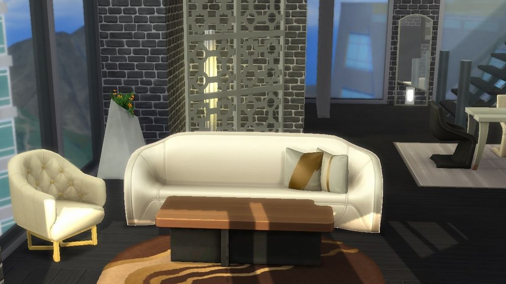 Appartamento di lusso con poltrona cuscino e tappeto
